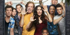 Un’immagine pubblicitaria della serie “Shameless”, con il cast prigioniero dietro un vetro forse infrangibile.