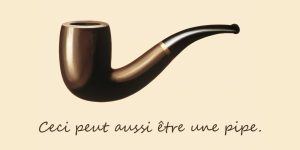 Un detournement del famoso dipinto surrealista di Magritte “La Trahison des images” (“Il tradimento delle immagini”), che nell’originale raffigura una pipa di profilo, col braciere a sinistra e il bocchino a destra, e una scritta in corsivo sotto la stessa che recita «Ceci n’est pas une pipe.» («Questa non è una pipa.»); in questa versione modificata, la scritta recita «Ceci peut aussi être un pipe.» («Questa potrebbe anche essere una pipa.»).