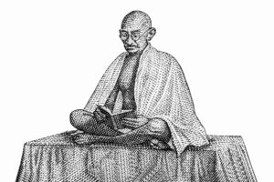 Un’illustrazione in bianco e nero che raffigura il “Mahatma” Gandhi mentre legge un libro aperto tra le mani poggiate sulle ginocchia, seduto nella posizione del loto, a gambe incrociate, con il busto e le spalle coperte da un mantello, sopra un supporto dalla forma di parallelepipedo, ricoperto da un telo. È il ritratto che campeggiava sulle banconote da 10 rupie coniate dall’India nel 1969.