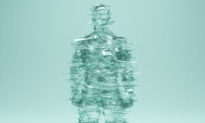 Una foto di Paul Campbell che ritrae da davanti una scultura intitolata “A Body Made of Glass”, fatta di frammenti di vetro, che raffigura un corpo umano maschile.